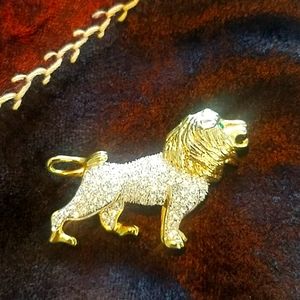 Bejeweled lion brooch